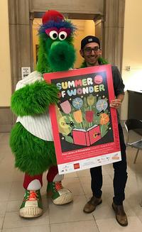 Artist Greg Pizzoli poses with the Phillie Phanatic at the Summer of Wonder Kickoff.